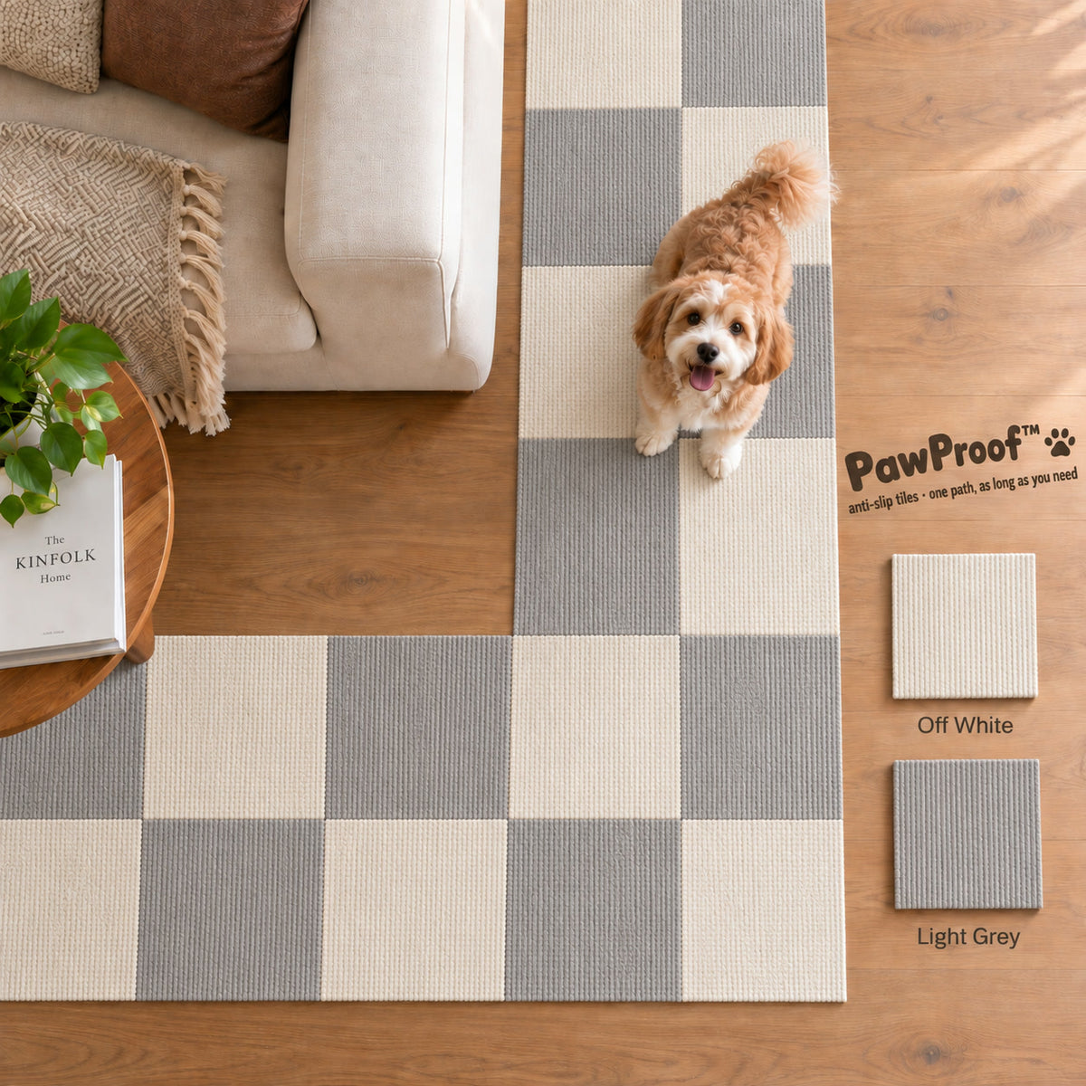 PawProof tiles in a light grey and off-white checkerboard across a living room floor, small dog sitting on them
