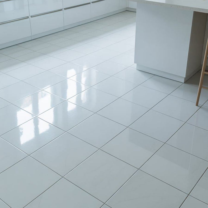 Smooth white tile floor in a kitchen