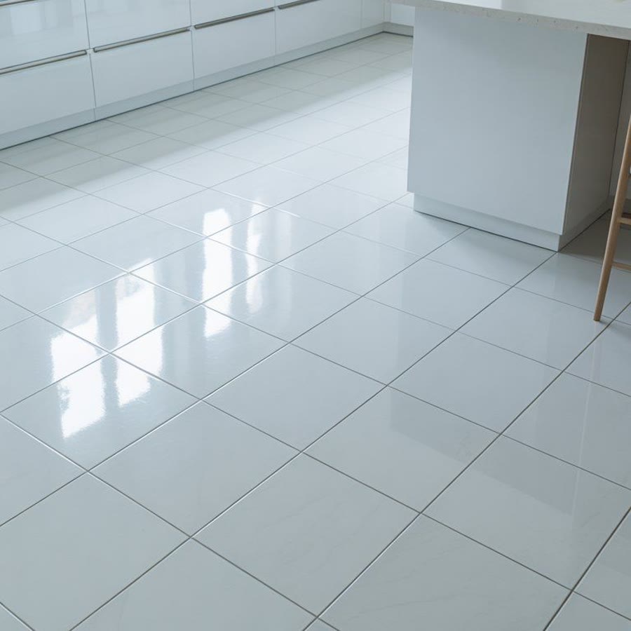 Smooth white tile floor in a kitchen